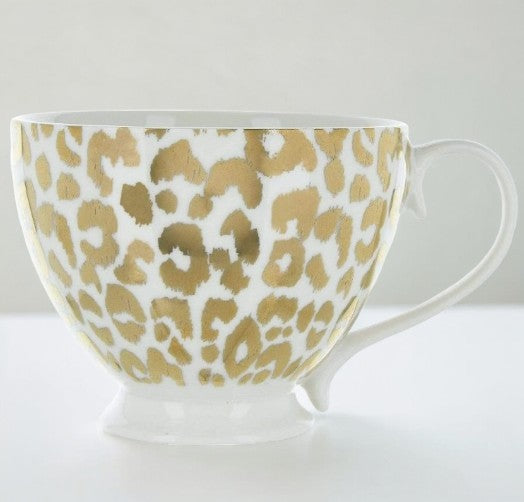 Animal Luxe footed mug with gold leopard spots and curved handle
