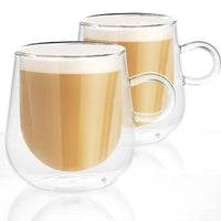 Pair of handled glass mugs filled with coffee