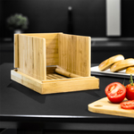 Bamboo Bread Slicer with a variety of bread types, showcasing its versatility and ability to slice different types of bread with ease