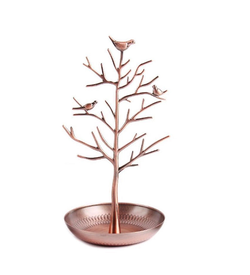 Rose-gold tree jewellery stand with bird-topped branches and round tray