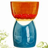 Rear view of Libby vase showing blue dungarees and red spotted headband