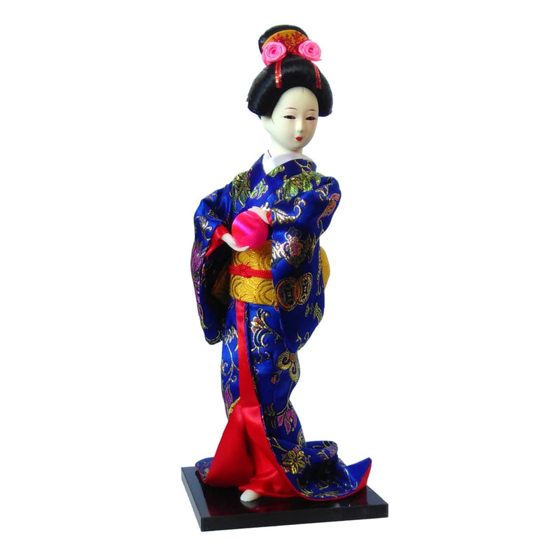 Decorative geisha doll in a blue floral kimono holding a pink ball on a black square base