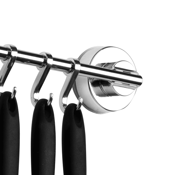 Close-up of a suction fitting and utensil hooks