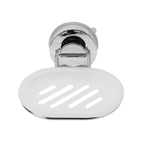 Front view of the white drainage slots in the suction-mounted soap dish