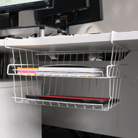 Two white storage baskets hanging beneath an office desk