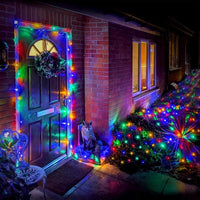 Multicoloured fairy lights shown around a decorated doorway