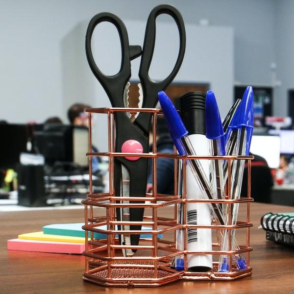 Close-up of scissors and pens in the rose gold desktop organiser
