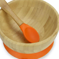 Close-up of the silicone-tipped spoon inside the bamboo bowl