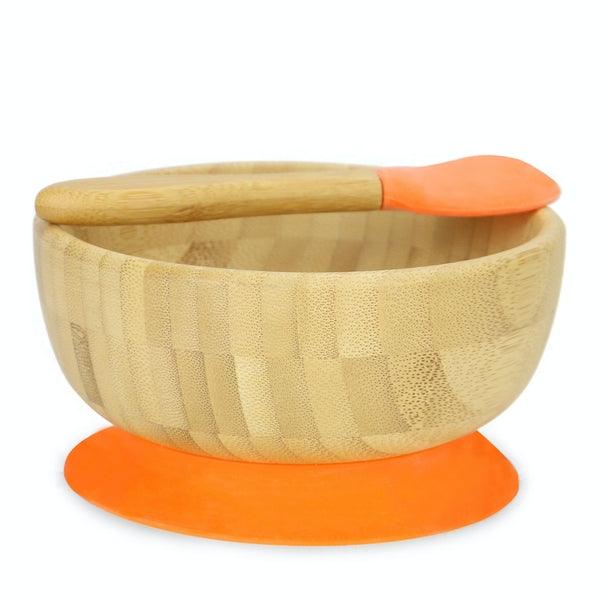 Bamboo bowl with the spoon resting across its rim