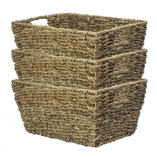 Three natural seagrass storage baskets nested together