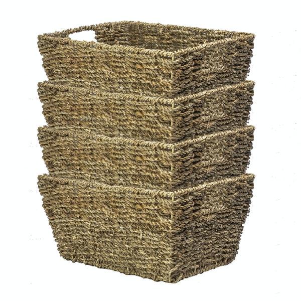 Four natural seagrass storage baskets nested together