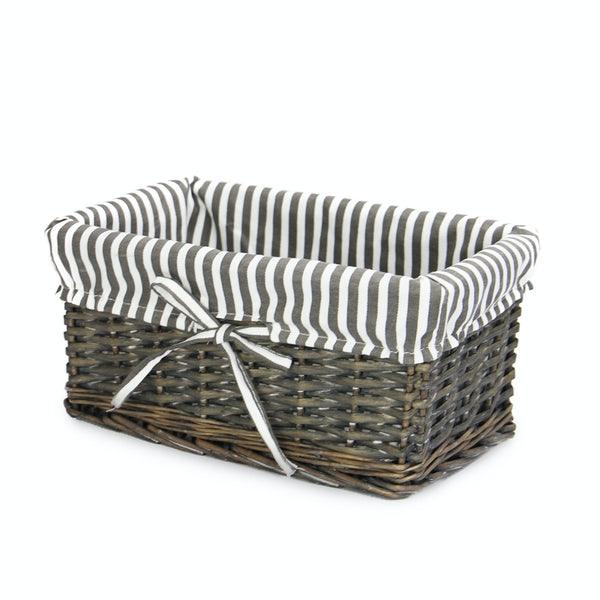 Empty medium wicker basket with striped fabric liner and bow