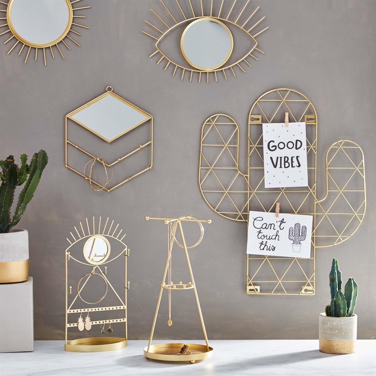 Eye See You jewellery stand displayed alongside other gold home accessories