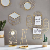 Eye See You jewellery stand displayed alongside other gold home accessories