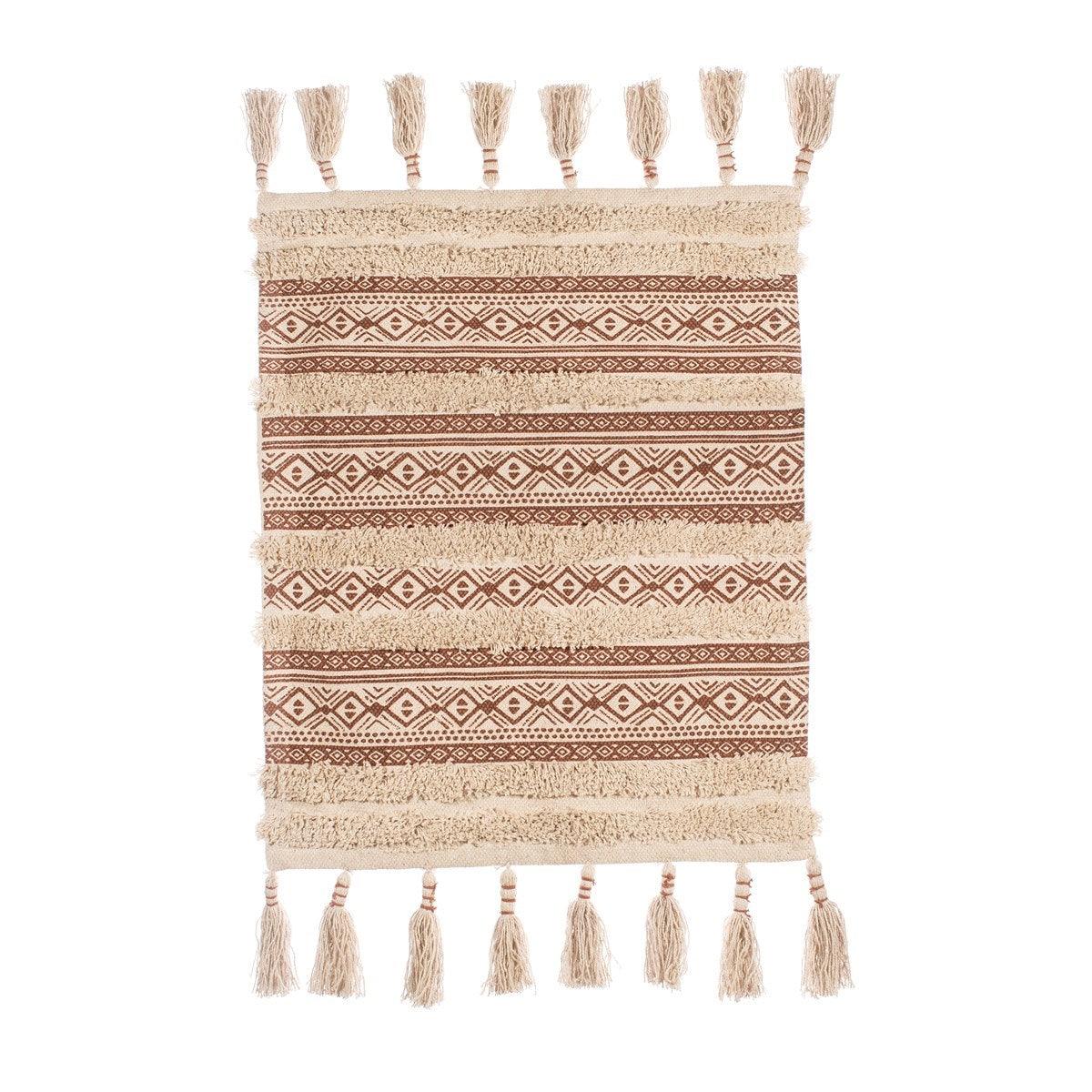 Full view of the Nomad geometric rug with twisted tassels