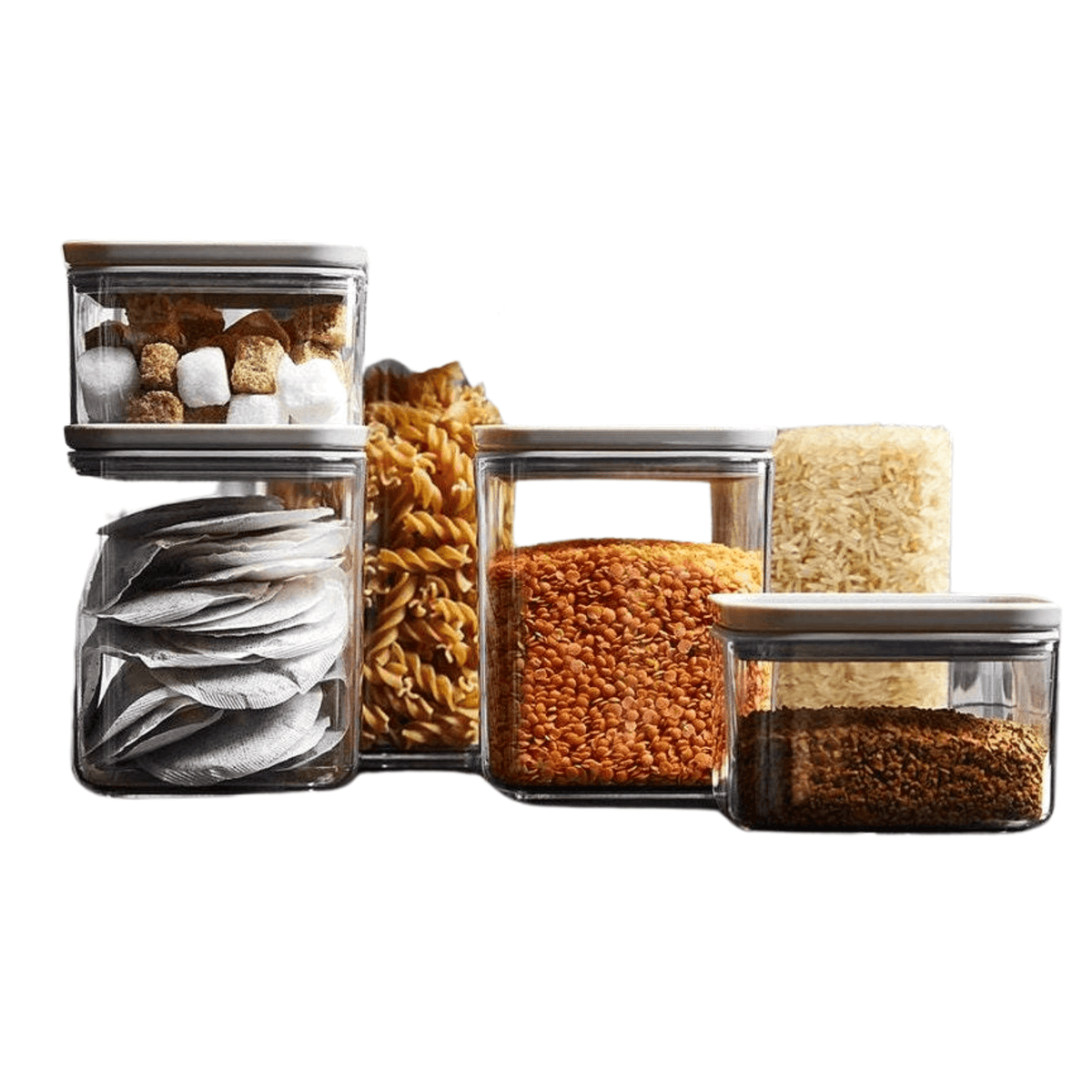 Airtight pantry containers with grey lids arranged with pasta, grains and snacks