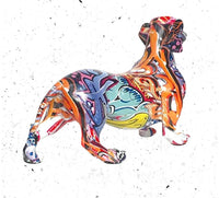Rear angled view of the graffiti dachshund ornament showing its multicoloured pattern