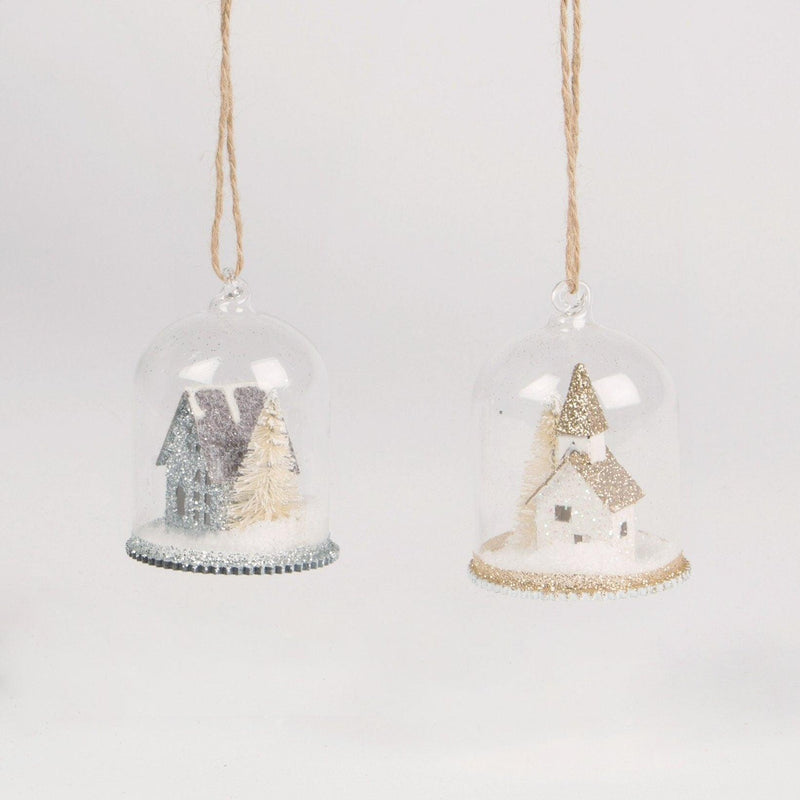Two assorted glass dome Christmas bauble designs with miniature houses, gold trees and jute loops; one supplied