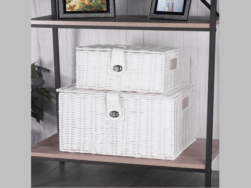 White lidded storage baskets arranged on an open shelf